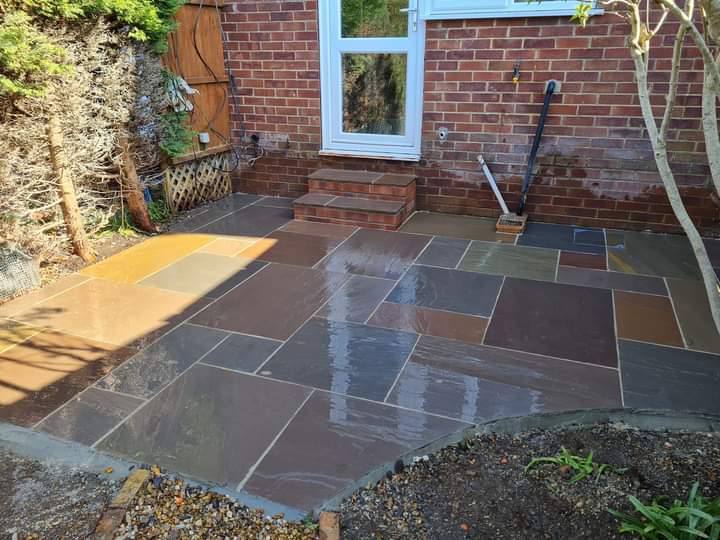 Beautiful natural stone patio installation by BM Interiors